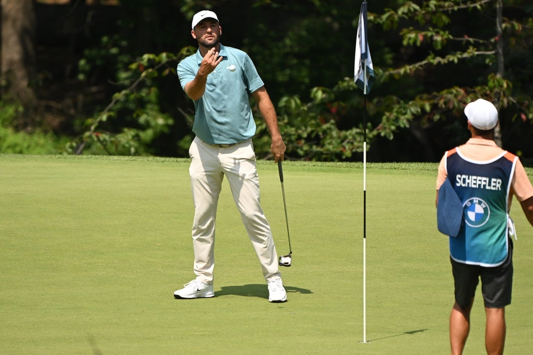 Scottie Scheffler chases down Robert MacIntyre for BMW title
