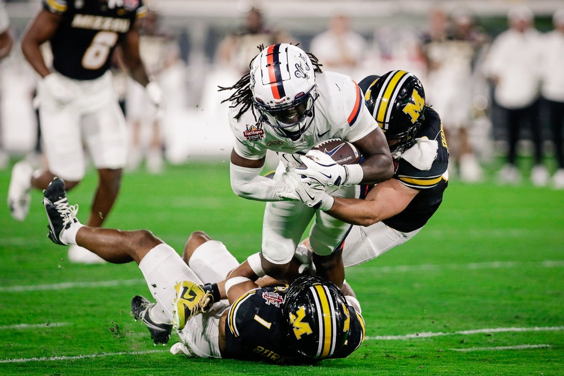 No. 19 Virginia throttles Missouri to capture Gator Bowl