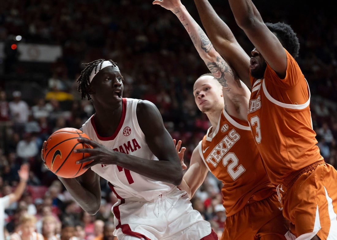 Texas hangs on to notch road upset of No. 13 Alabama