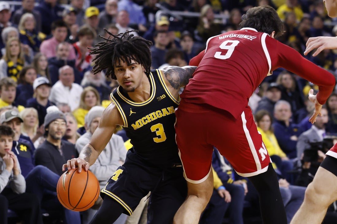 No. 3 Michigan uses defense late to hand No. 5 Nebraska its first loss