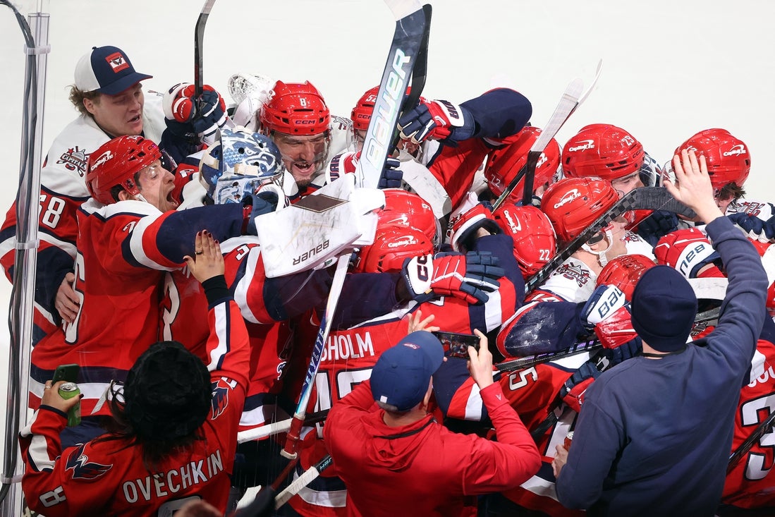 NHL roundup: Down 3-0, Caps storm past rival Canes in OT