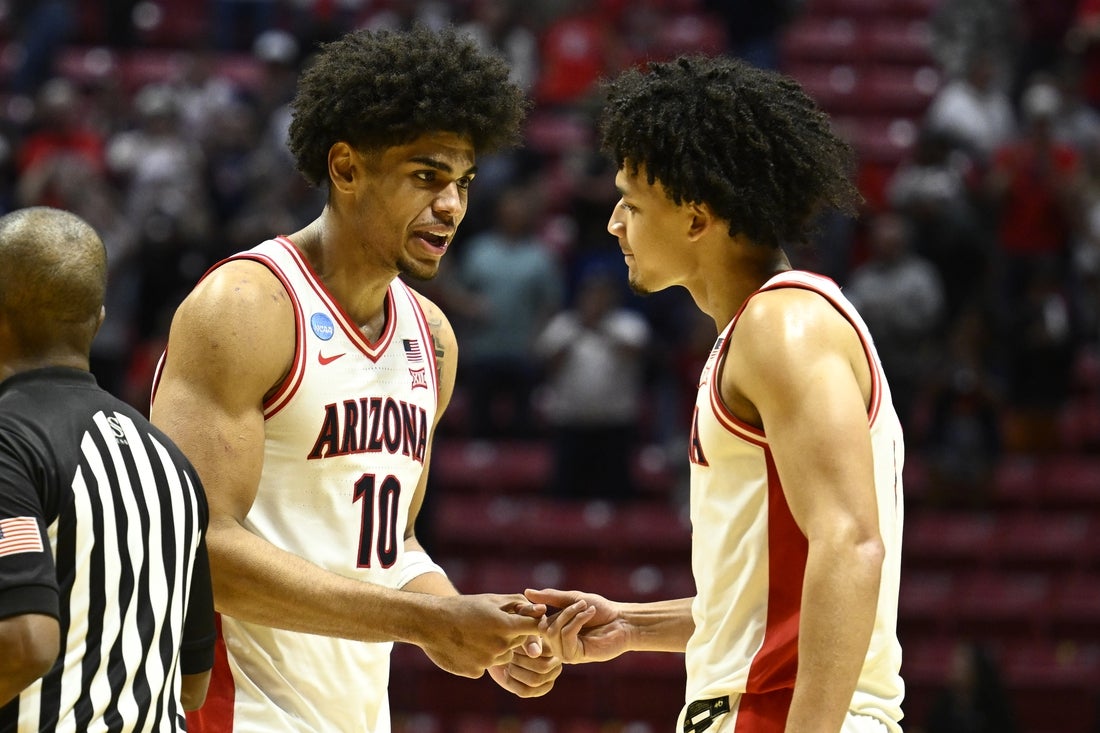 Arizona holds off Utah State’s surge to reach 3rd consecutive Sweet 16