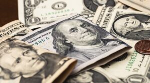 U.S. Dollar Wavers as Middle East Uncertainty and Central Bank Decisions Weigh on Markets