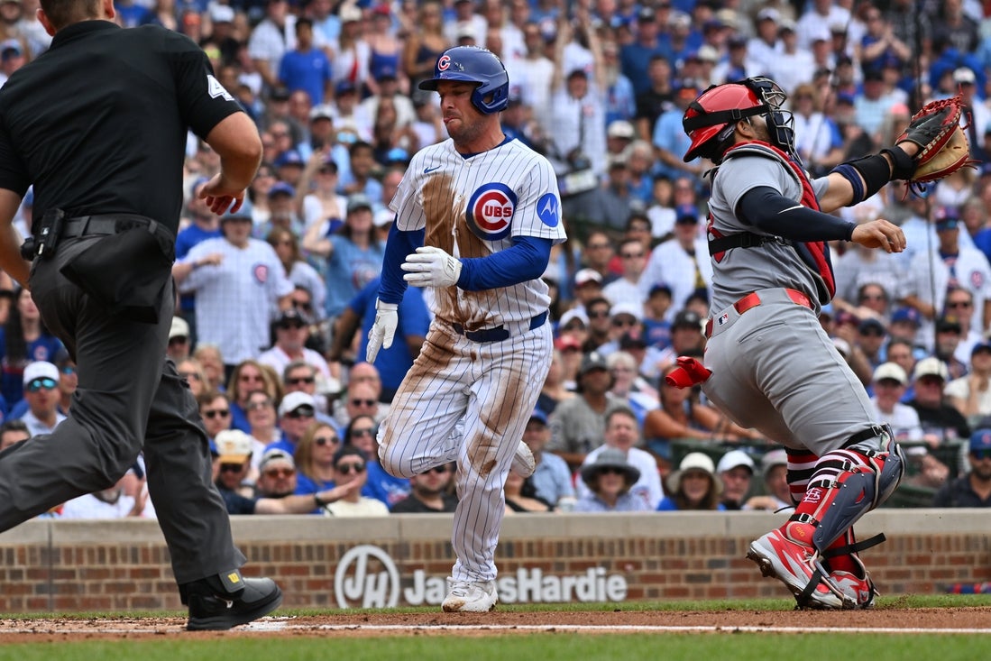 Cubs avoid sweep, score 4 in 6th to rally past Cardinals